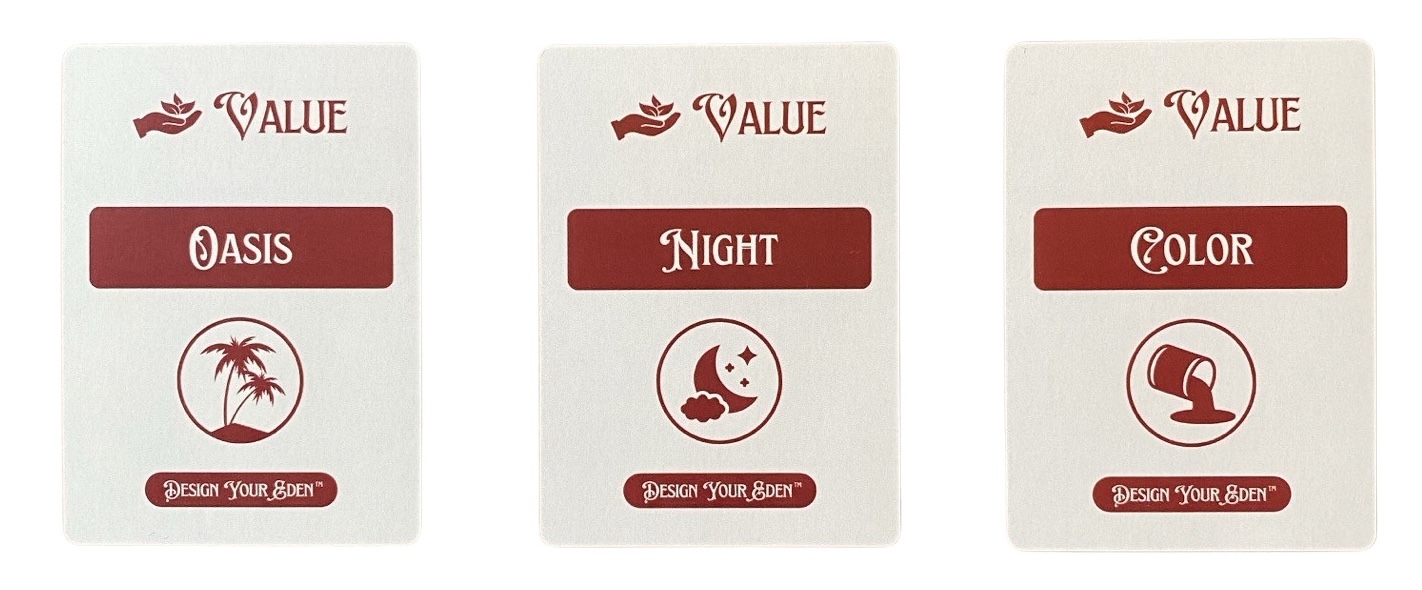Three playing cards listing value words