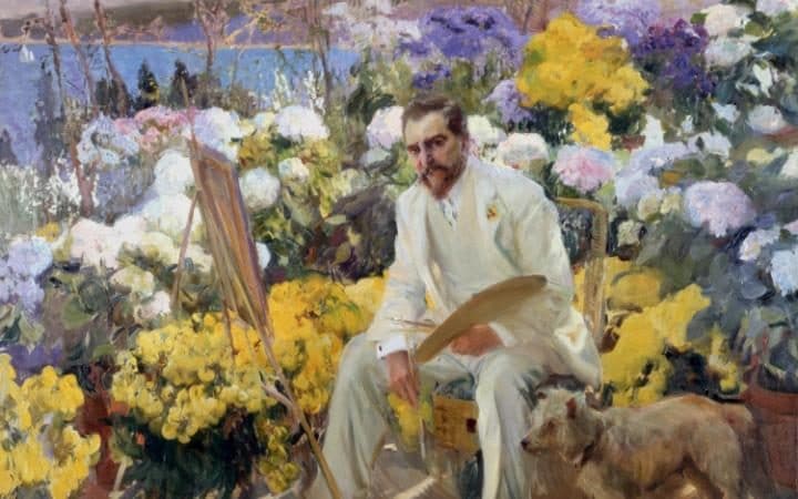 Painting of man in white suit sitting painting amongst flowers